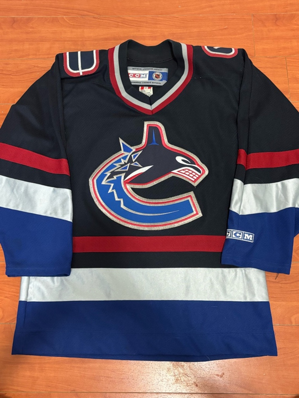 CCM Black Hockey Jersey with Red and White Trim